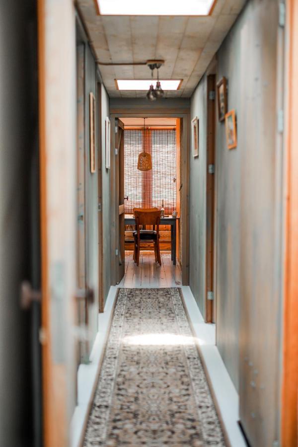 In De Aap - Appartementen & Guesthouse 卑尔根 外观 照片