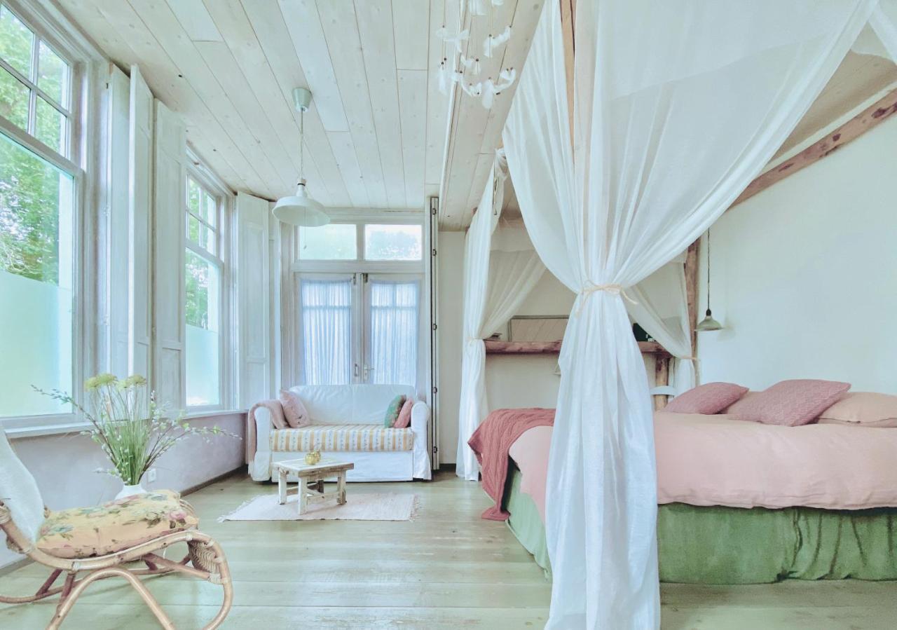 In De Aap - Appartementen & Guesthouse 卑尔根 外观 照片