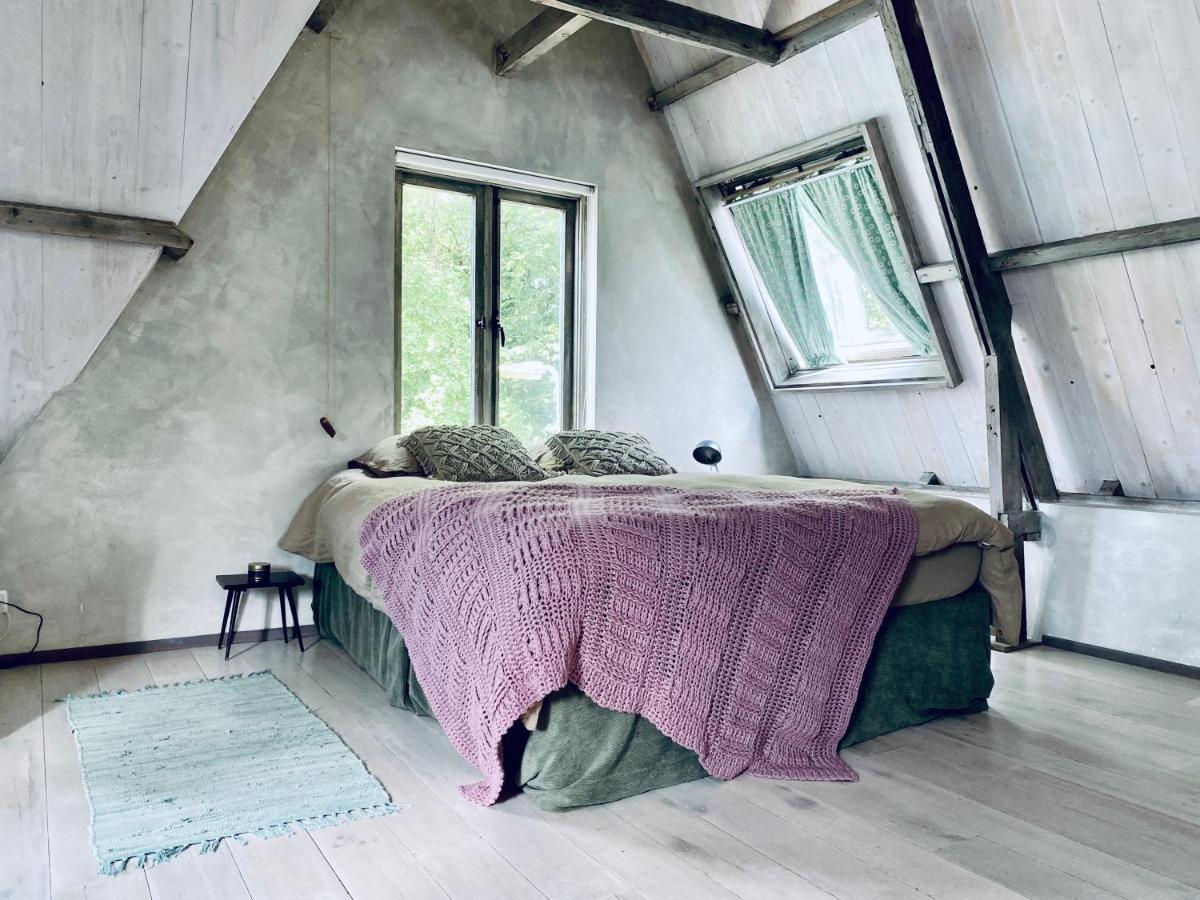 In De Aap - Appartementen & Guesthouse 卑尔根 外观 照片